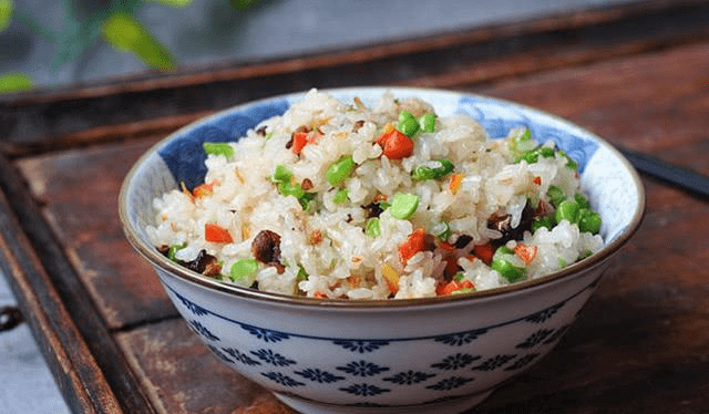 怎样做好吃的糯米饭 f7b80bf907154878ae986fc81fddd58f.png