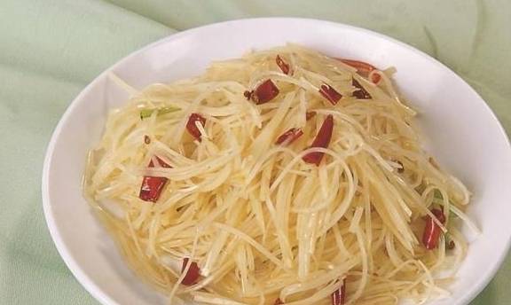 土豆丝炒肉丝怎么炒不粘 70ff5e5080454369bb5d98636de9e118.jpeg