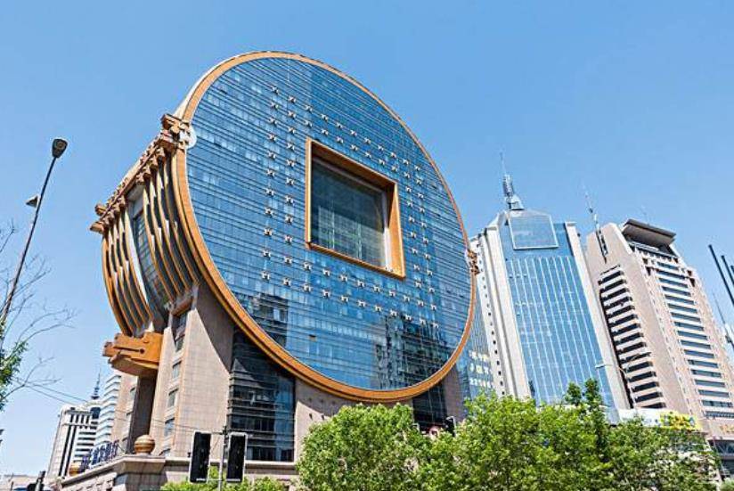原创广州和沈阳这两座很相似的建筑,跟铜钱非常像,中国最丑建筑之一