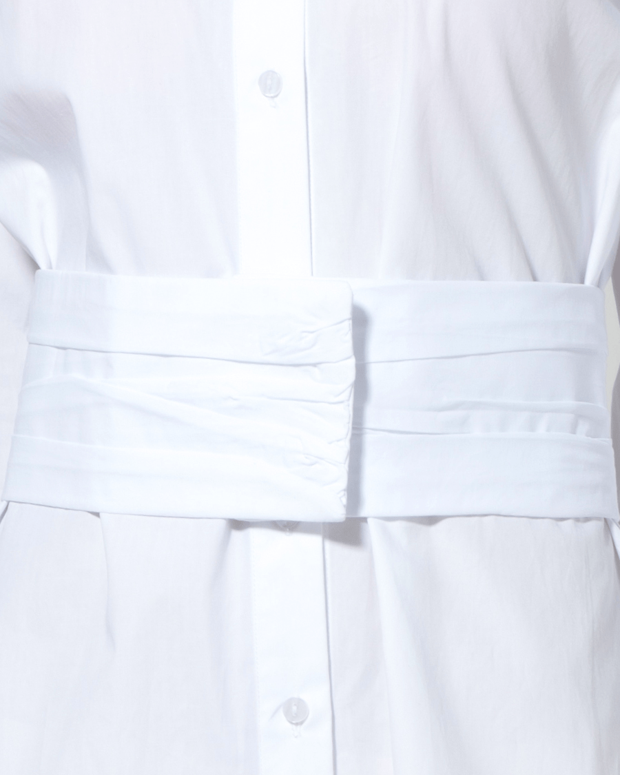 雷竞技平台官网|
百纳服装设计别致腰带长款衬衣的原因