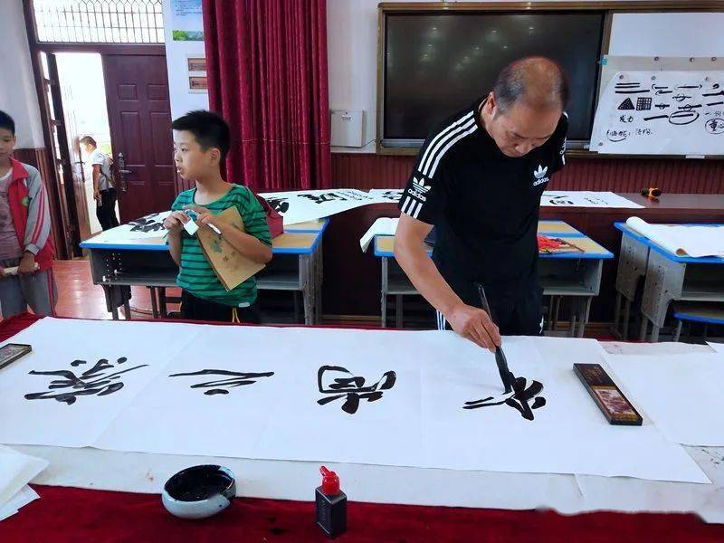 书法名家进校园 墨香芬芳育英才—全州县书法家书法讲座走进城北完