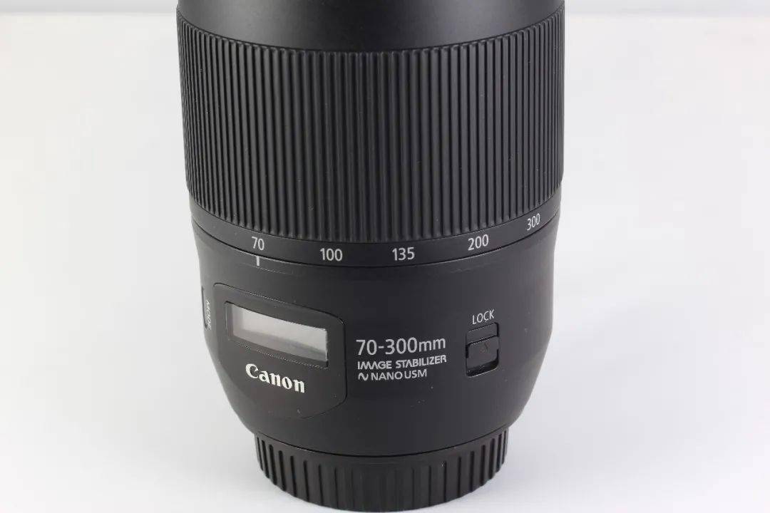 15,佳能70-300 二代 防抖 成色99新 2300元