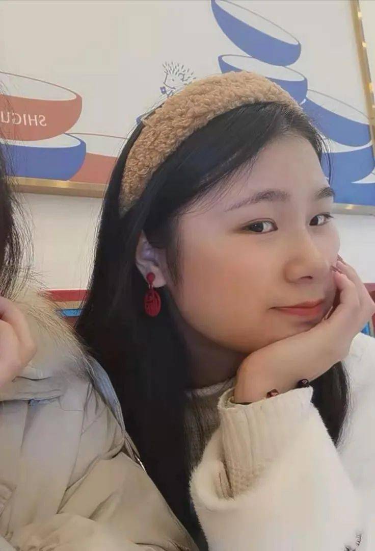 陶丽  