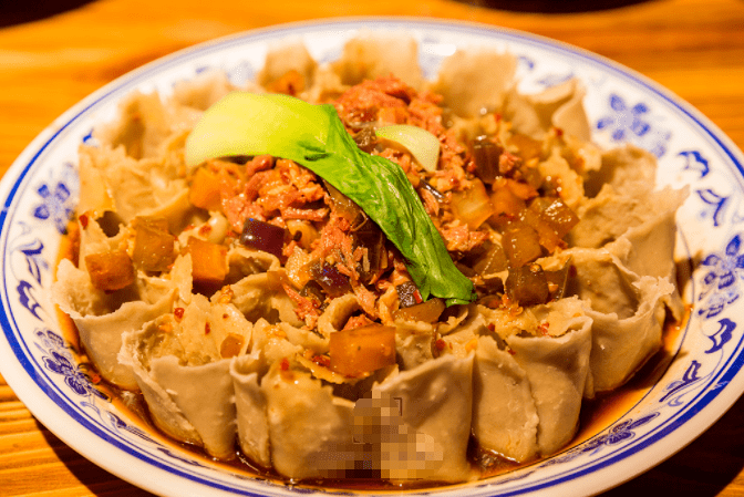 07 保德碗托 保德碗托是山西忻州保德县的一种传统小吃美食,风味独特