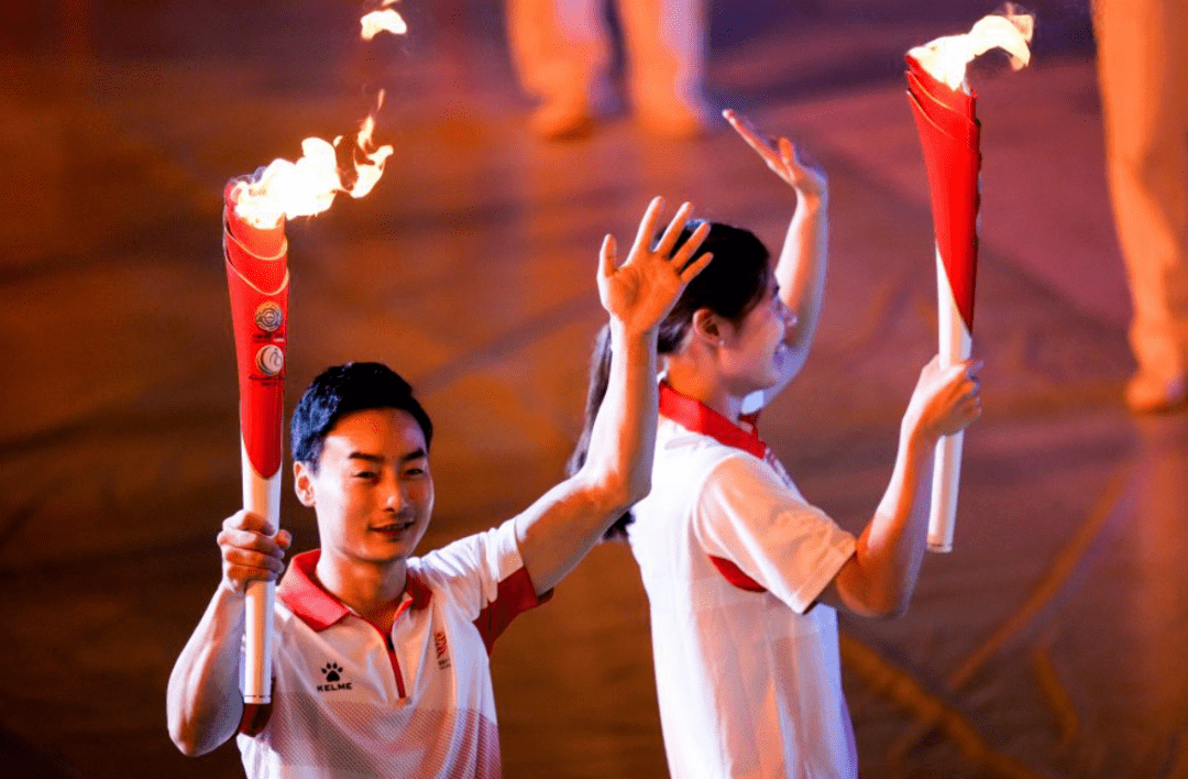 全运火炬接续传递 中国体育薪火相传