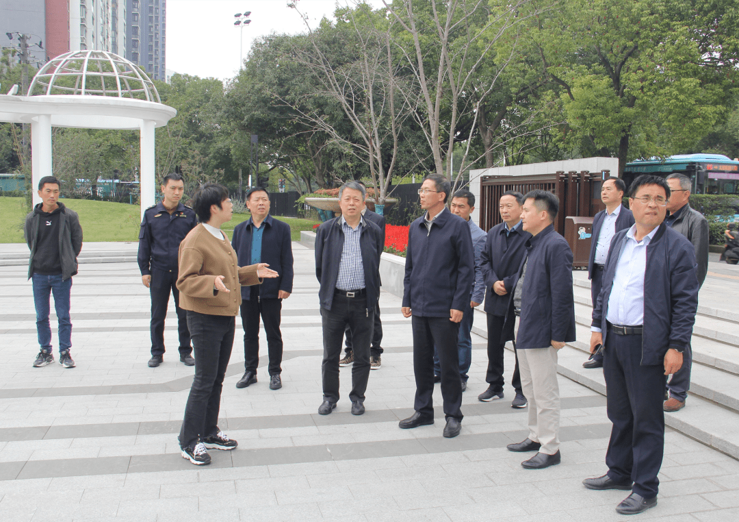 区政协副主席祝志明率城建委,区城管局及相关社区负责人陪同考察交流.