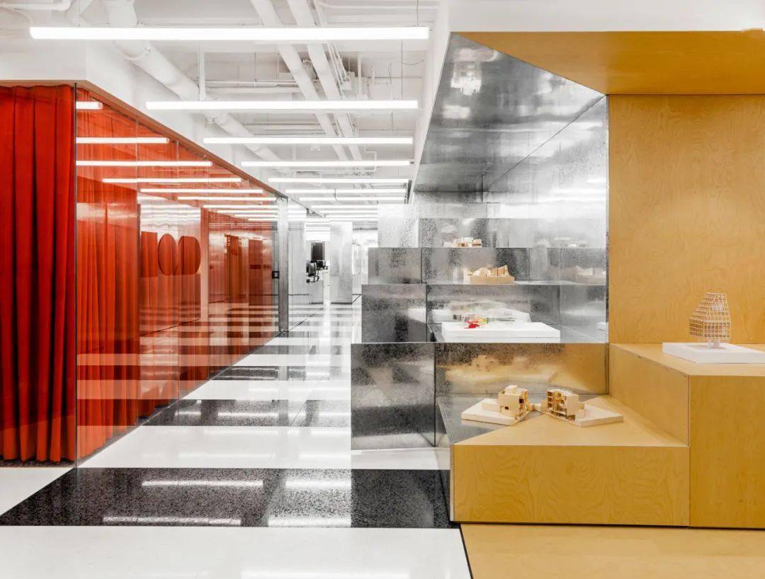 white materials and furniture contrast with warm wood and color