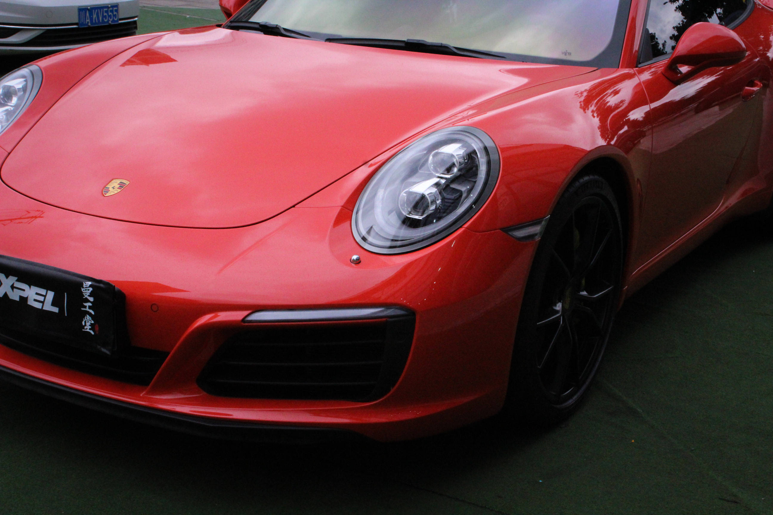 熔岩橙红保时捷911,成都xpel隐形车衣曼工堂贴膜