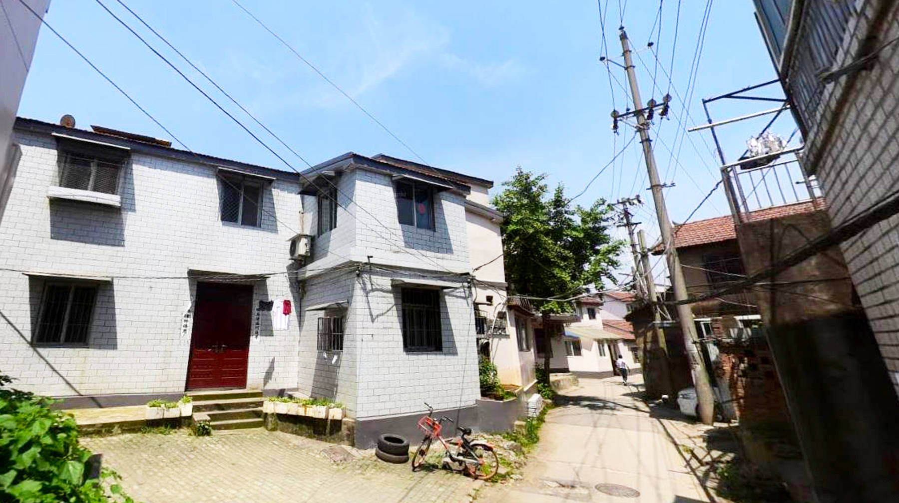 武汉城区有座静谧的城中村建在橘色长江大桥旁旧房子勾起记忆