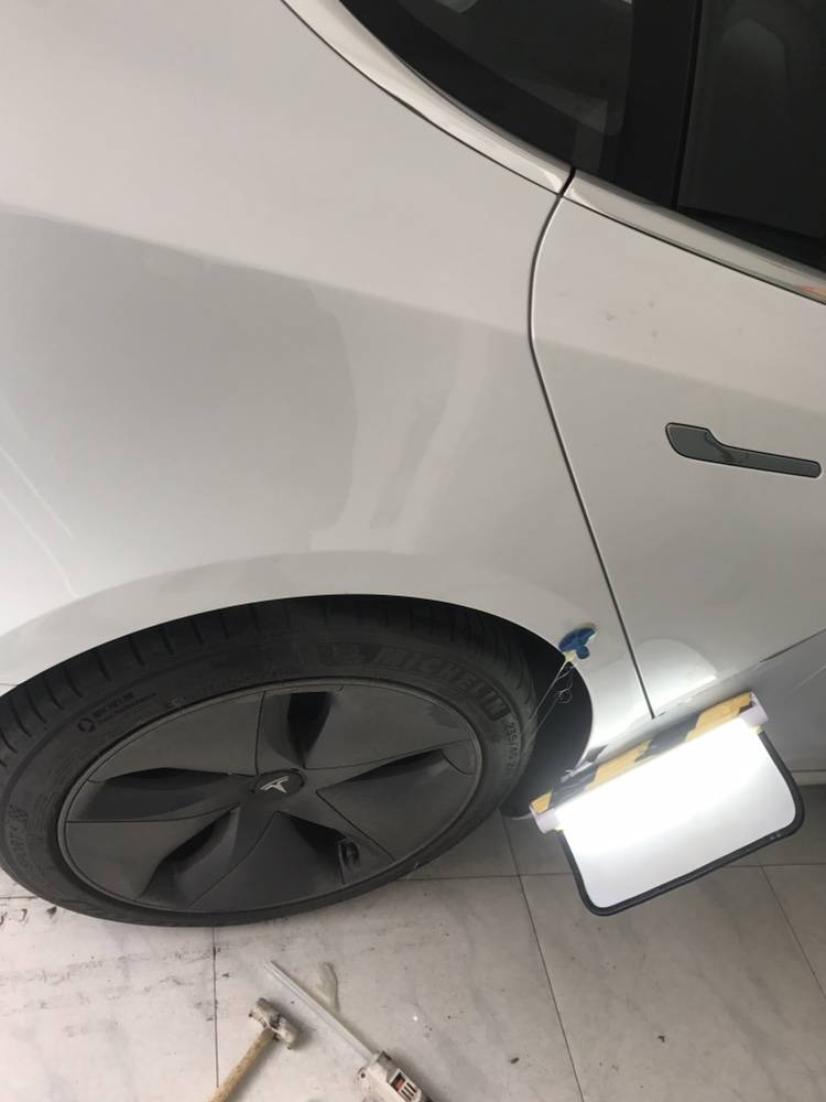 新车叶子板挤凹了要如何无痕修复