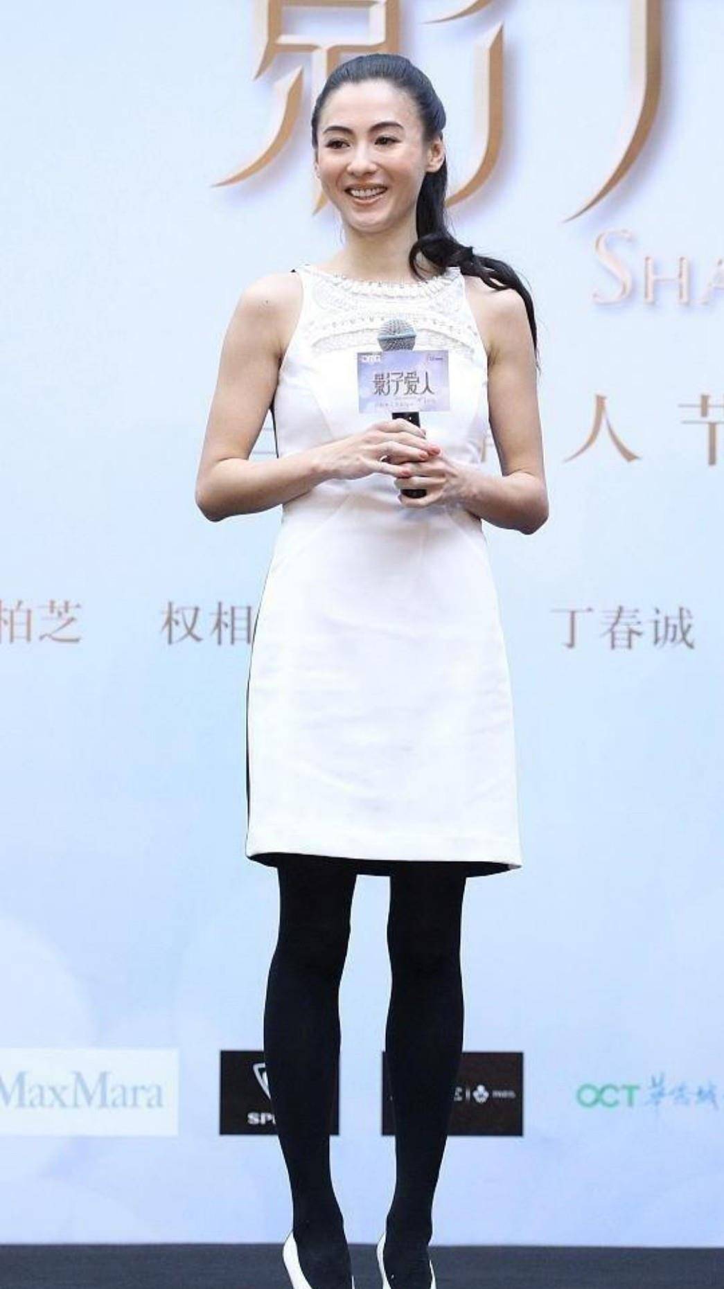 张柏芝当了妈妈还那么大胆脚蹬20cm高跟鞋还用渔网衫搭配西装