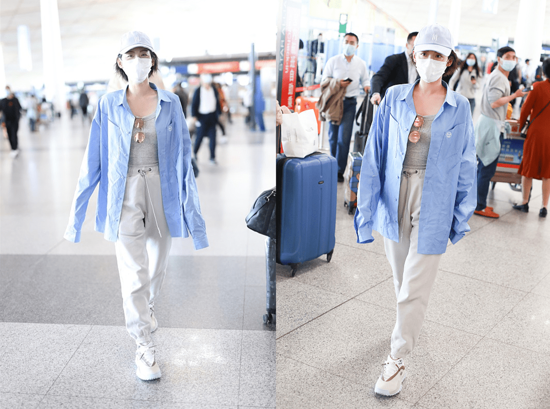 显得|张嘉倪和买超的身高差距有点大,但穿搭真不赖,黑白配层次感挺强