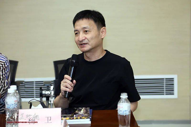 魅力的本质与时代的共鸣袁文彬艺术展学术研讨会在滨海美术馆举行