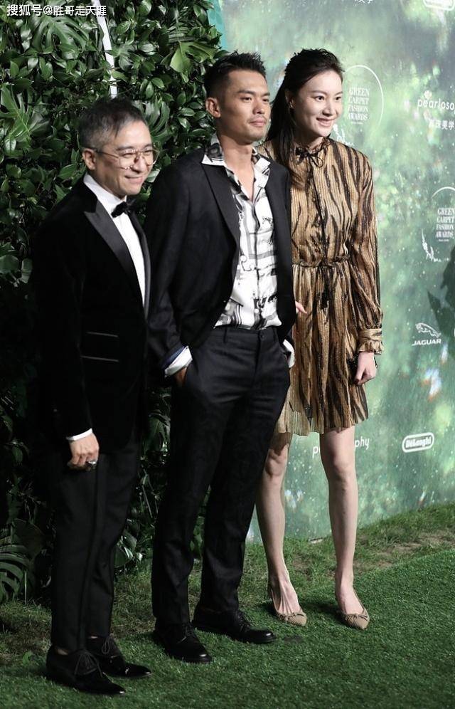 林丹挺 不打球的林丹挺有总裁范儿，谢杏芳裙装相配，姐弟恋的感觉挺浓