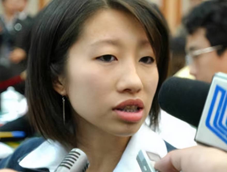 陆莉:16岁满分夺冠,巅峰期因病退役,远嫁国外后多年不改国籍_体操