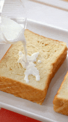 做这种爆浆吐司,你们最好用这种厚吐司来做,吸足了牛奶也不会瘫软.