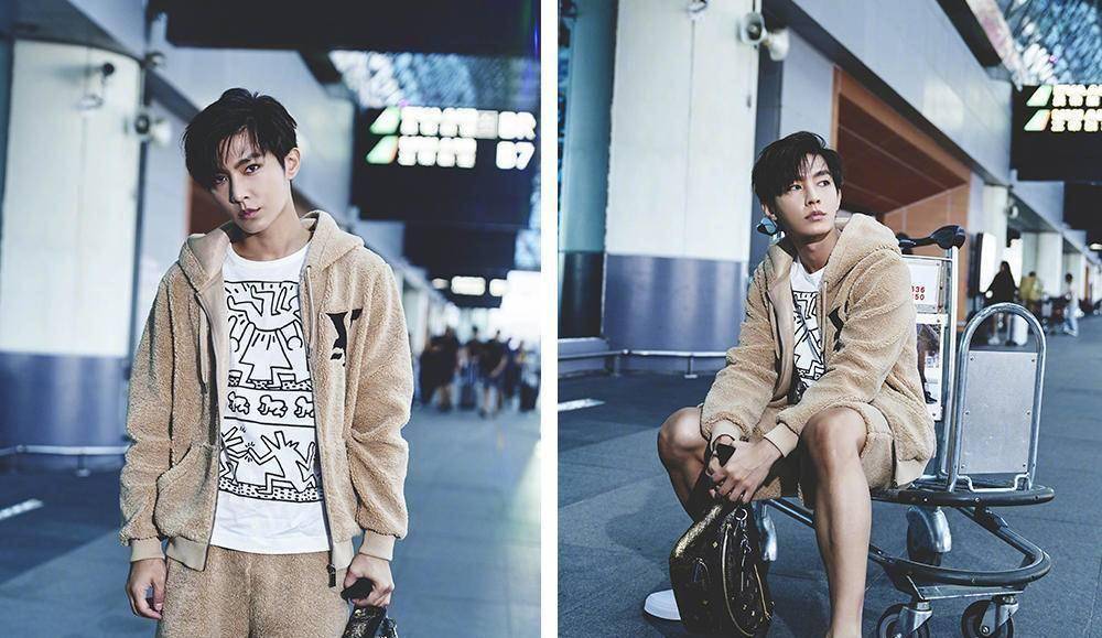 和明道同框,一个露着小腿造型清爽,一个大衣长裤还裹着围巾,温度彻底