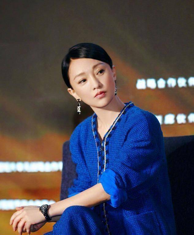 周迅早期造型被曝光,染橘黄发色鬼马精灵,比"女团"美多了_女性_气息