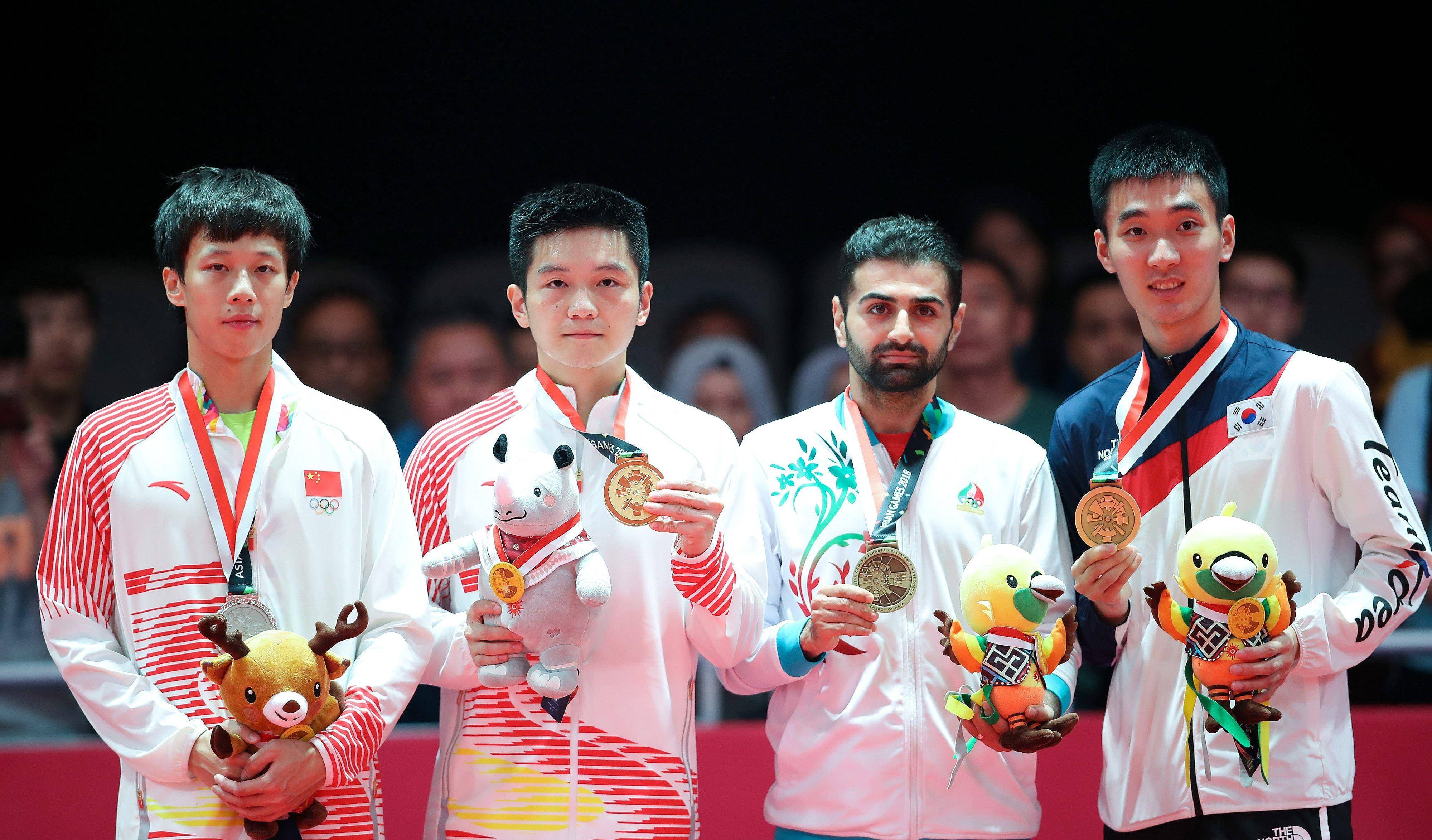 亚运会乒乓球:樊振东王楚钦4-0完胜国外组合 获得男双金牌