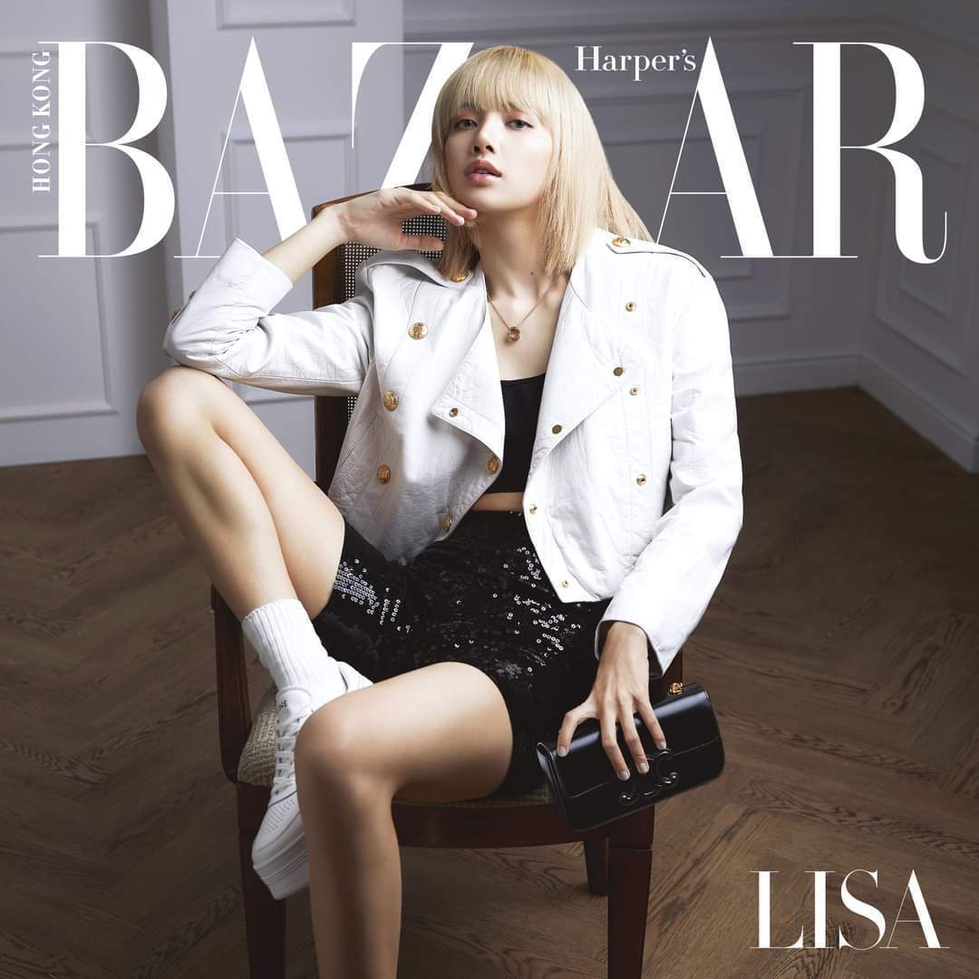 LISA金色发型魅力四射 简约穿搭彰显随性率真-搜狐大视野-搜狐新闻