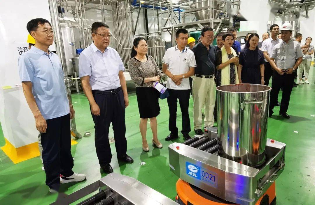 市重大项目办主任张国平等陪同下,前往内蒙古红太阳食品有限公司调研