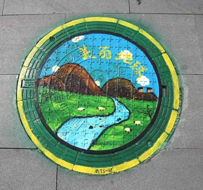 井盖变景盖活波又可爱创意涂鸦巧手扮靓公园