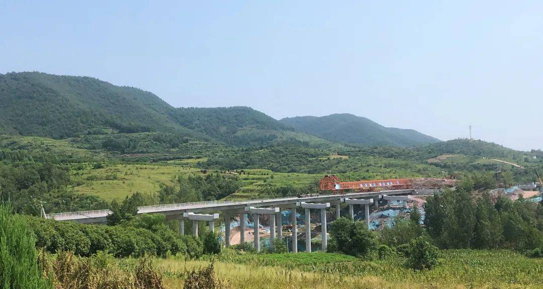 西淅高速公路河南省高速公路重要的"双千工程"带动豫西南经济社会发展