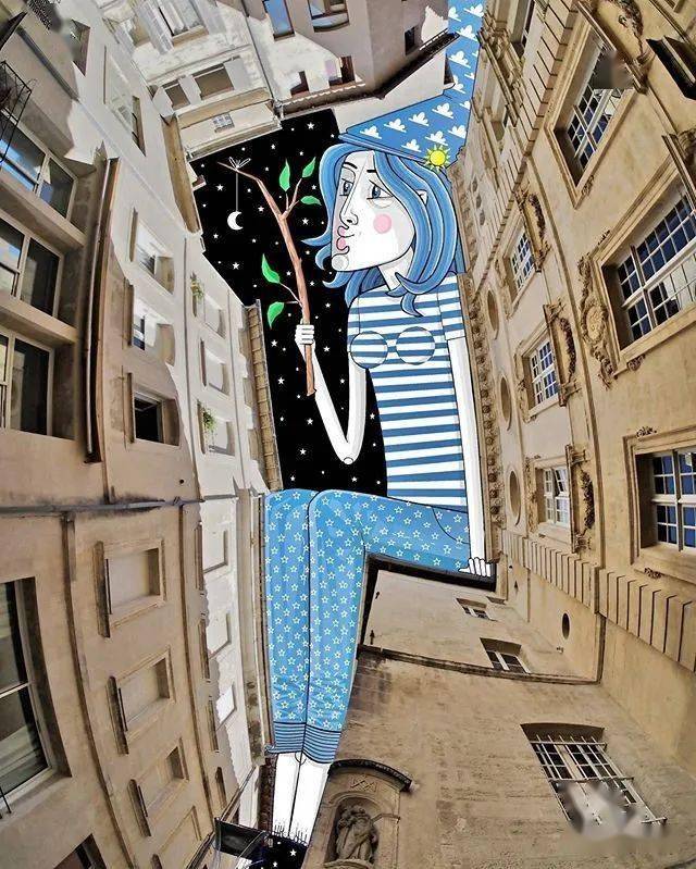 法国艺术家仰望天空的创意涂鸦