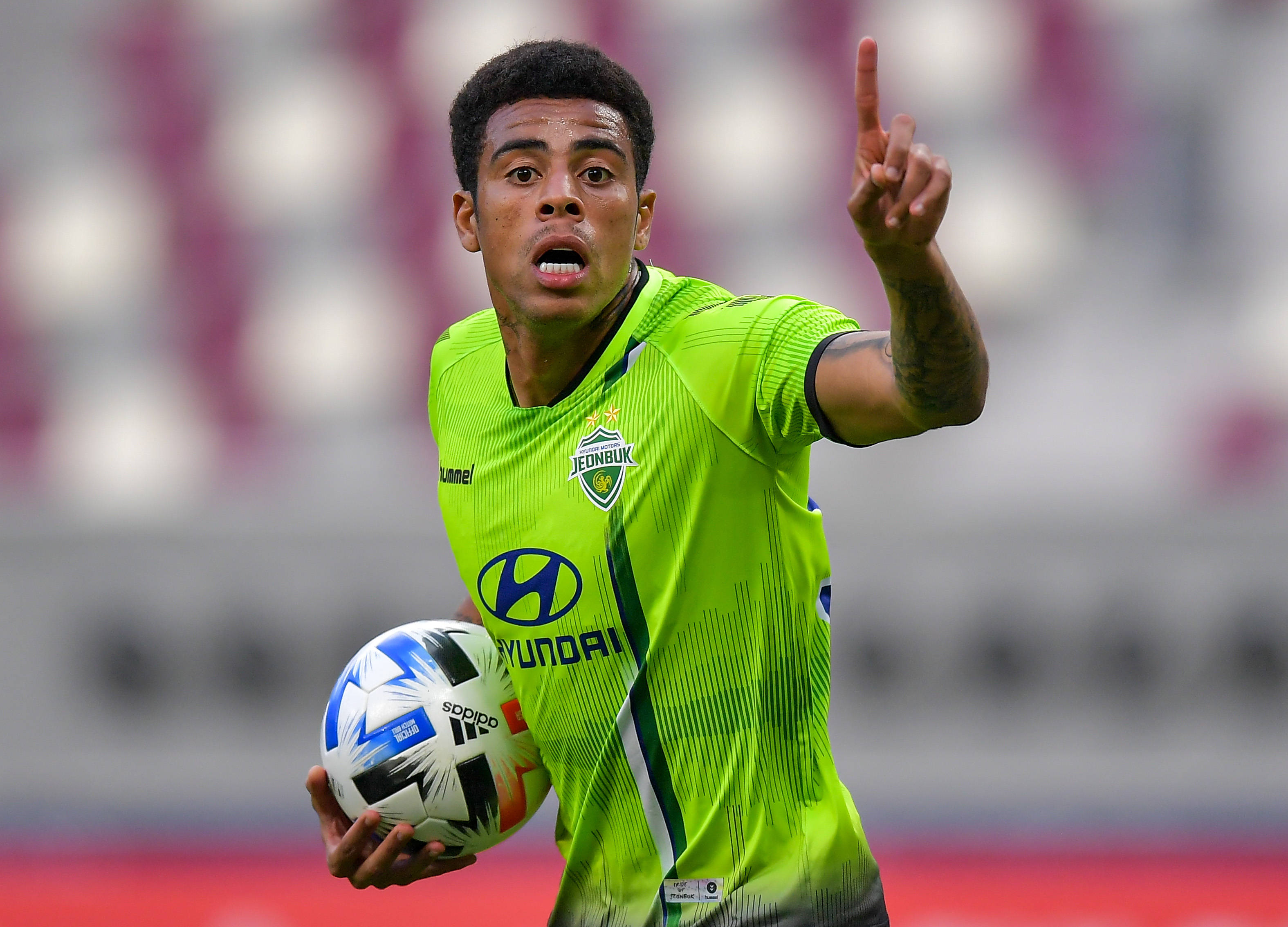 足球——亚冠:上海上港胜全北现代