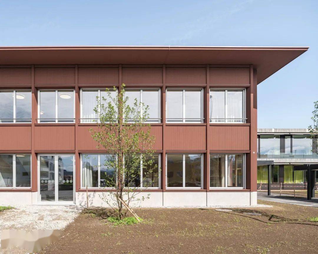 the new school building is accessible via a spacious, covered