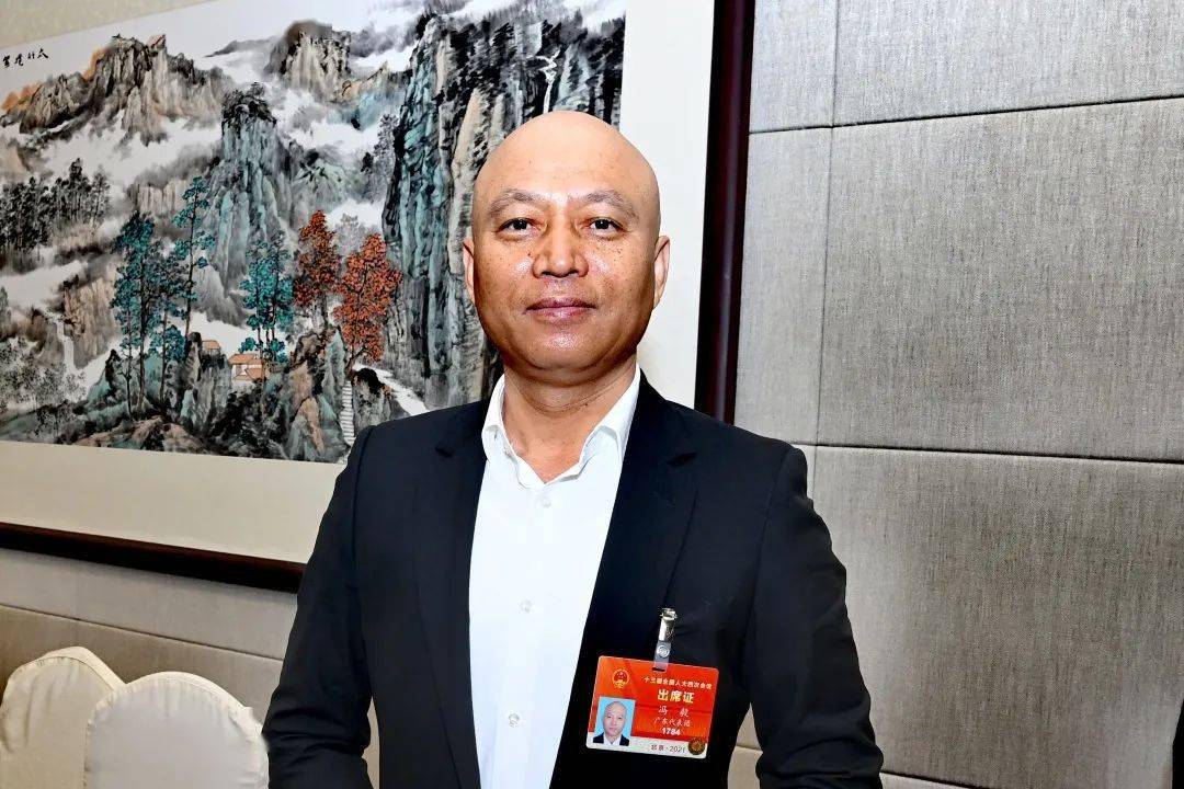 冯毅 代表另外,我也非常关注强化动物疫病防控体系的建设,提高我们