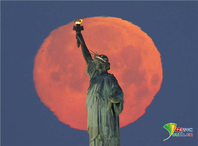 奇景|惊艳！“超级粉红月亮”在世界多国登场
