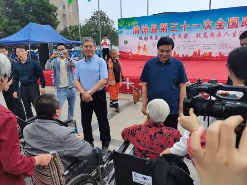 县委党校校长雷学义,县政府党组成员,副县长,县残工委主任赵四顺出席
