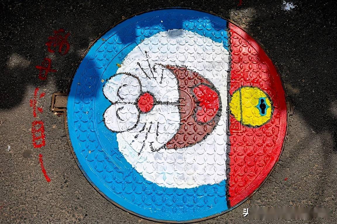 辽宁沈阳:手绘井盖 文明宣传"靓"新招_和平鸽