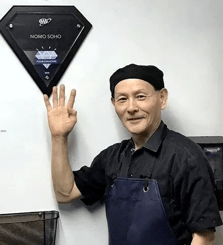 三年每年有3万人自杀的日本,有这样一位中国人,顽强地含泪活着_丁尚彪