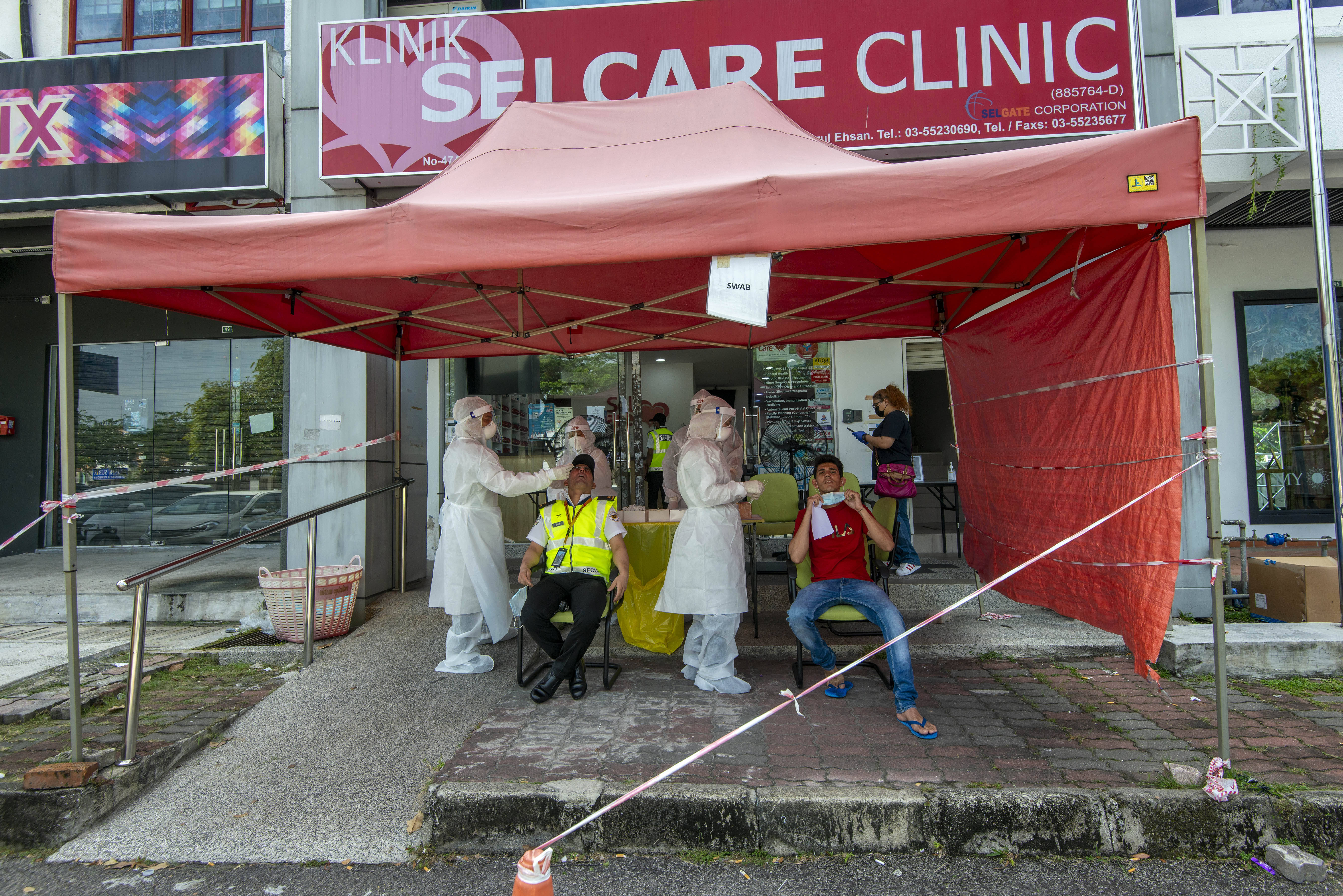 马来西亚新增新冠肺炎确诊病例连续三日过万