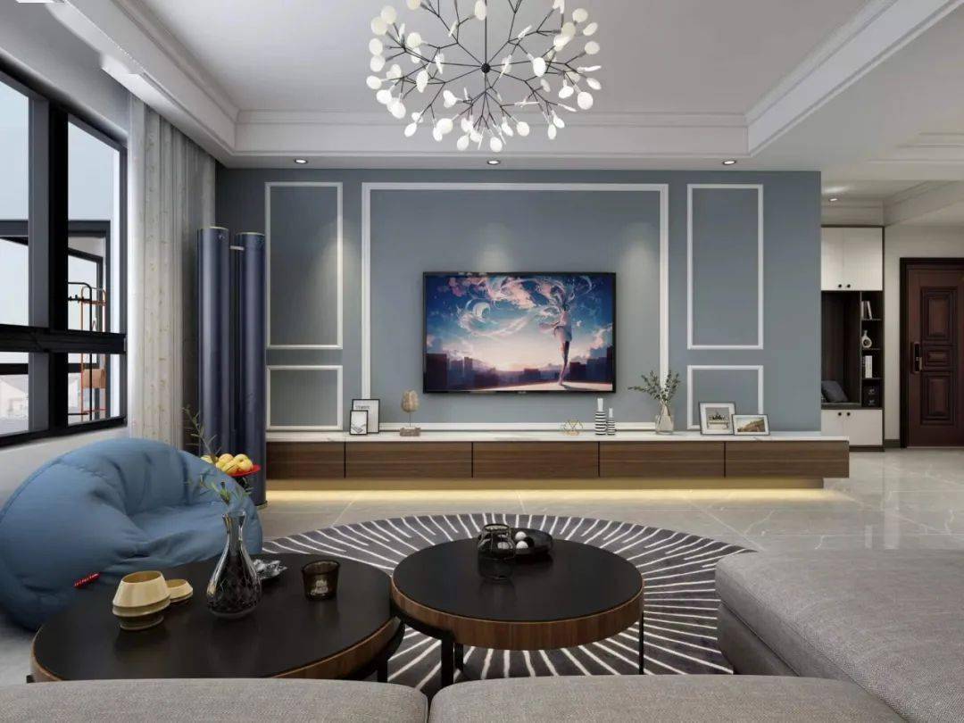 干净的白色石膏线搭配雾霾蓝电视背景墙,增加了空间的层次感