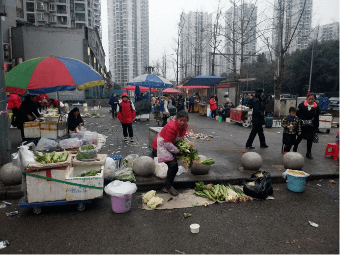 摊车|曾经“脏乱差”的早餐摊为何“焕然一新”？