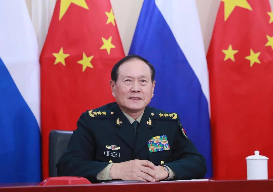李晓伟摄中国海军司令员董军,空军司令员常丁求,俄罗斯海军总司令叶夫