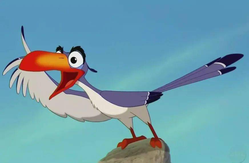 落在青铜储贝器上的犀鸟