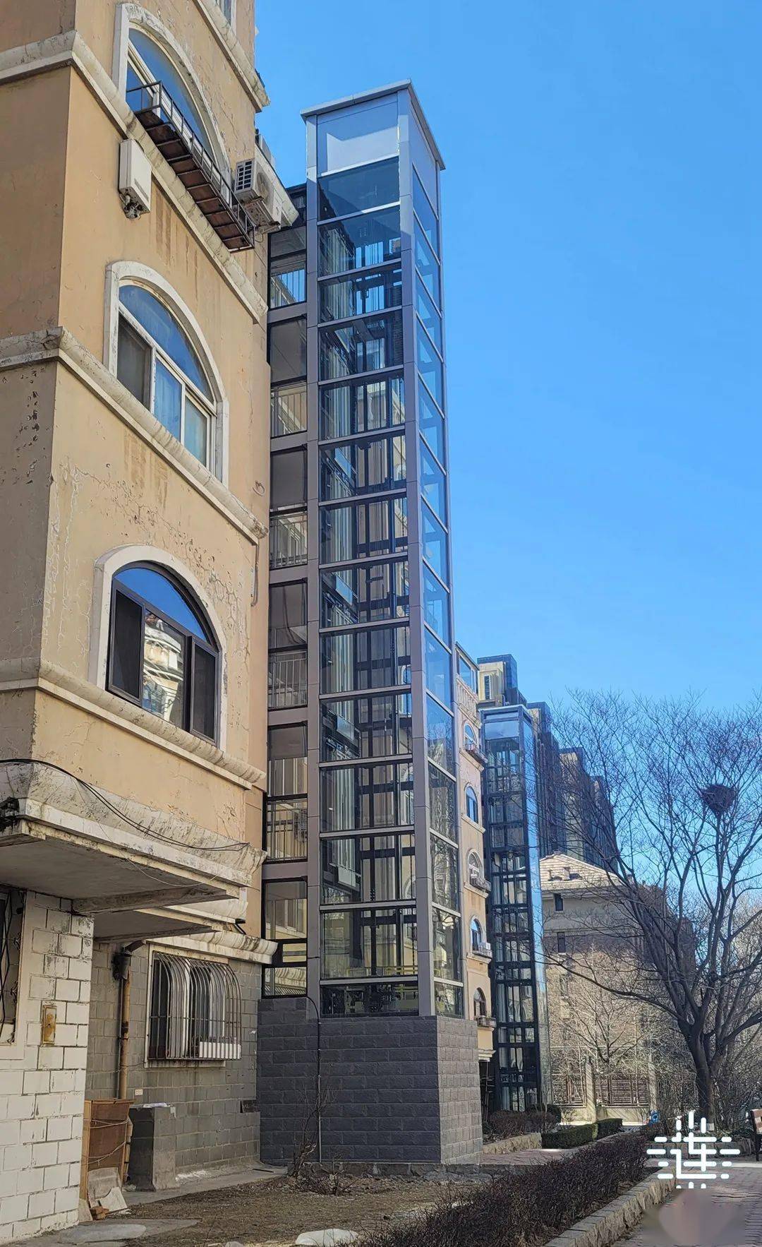 大连老楼电梯连片加装试点