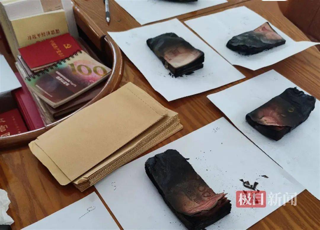 50万现金被烧焦,银行"抢救"人员:大气都不敢出……_鉴定_清点_人民币