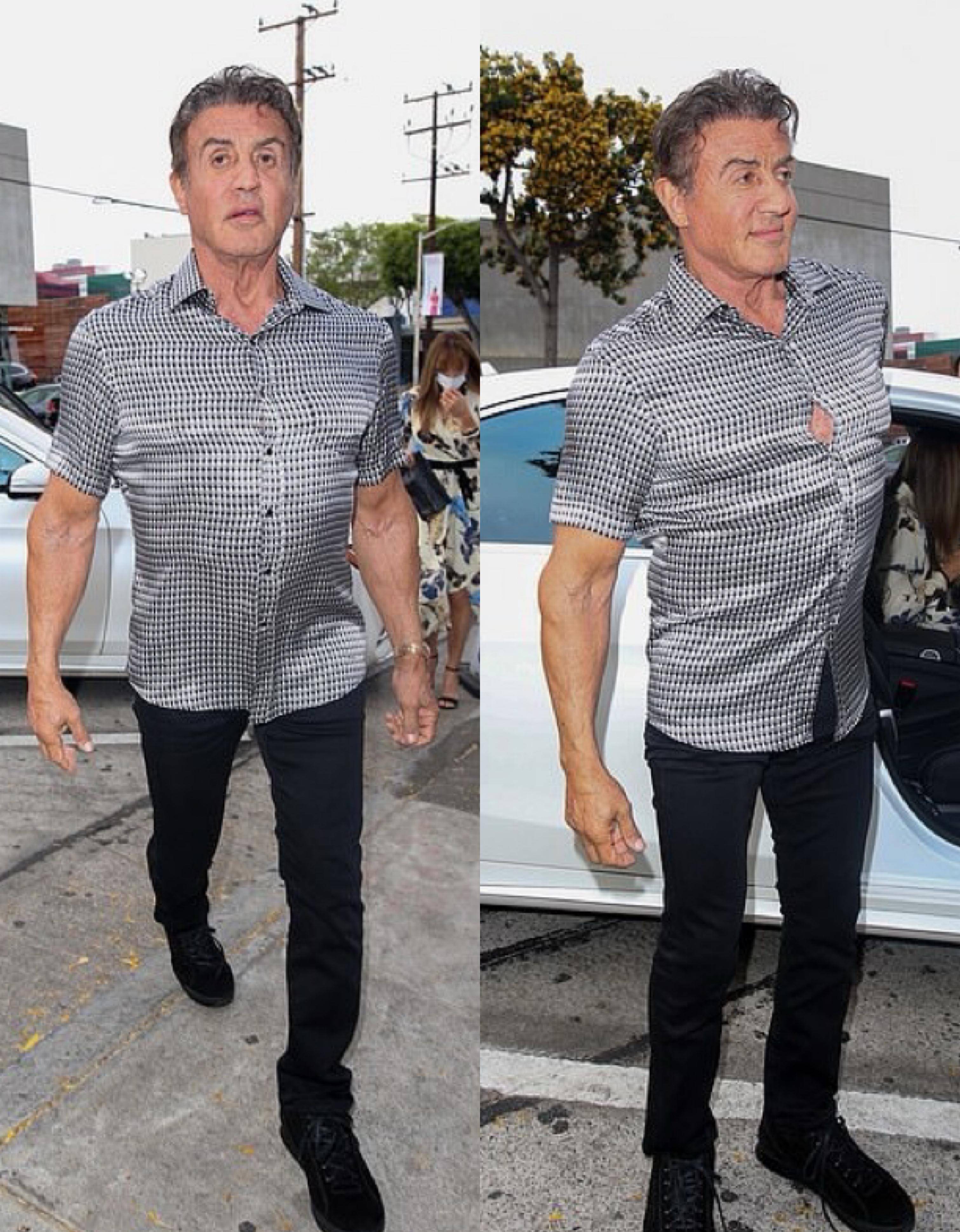 74岁史泰龙带小22岁娇妻甜蜜用餐 健硕肌肉已撑爆衣服_夫妻俩_黑色