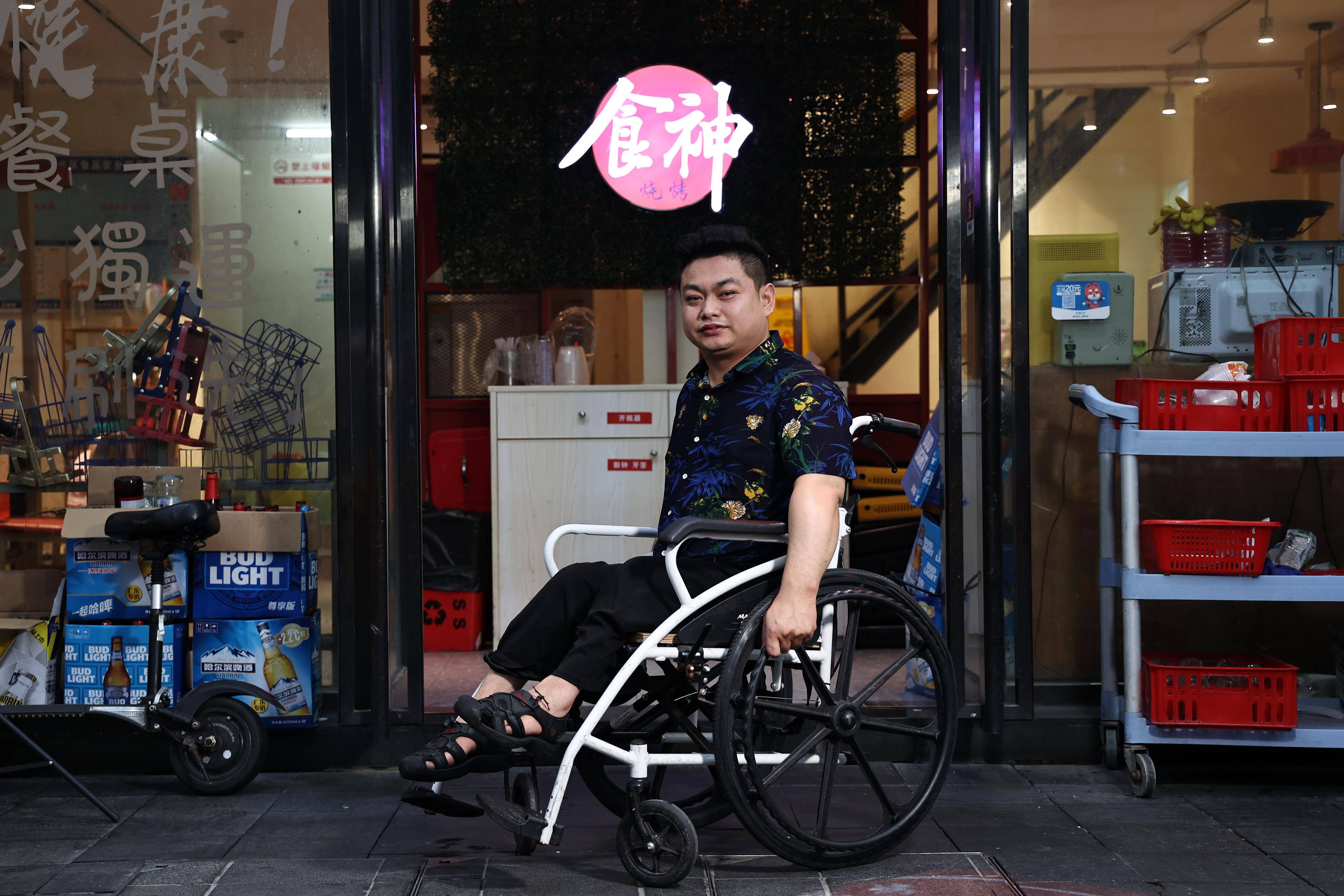 轮椅画家张斌个人资料图片