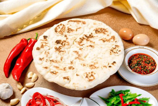 锡伯大饼锡伯族的饮食文化要从锡伯族的历史说起.