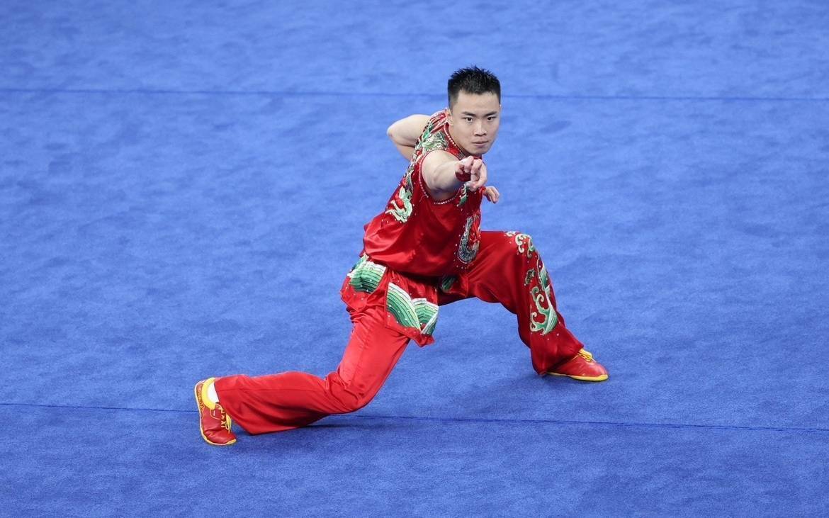 新京报记者 王飞 摄成都大运会武术项目男子南拳决赛在城北体育馆进行