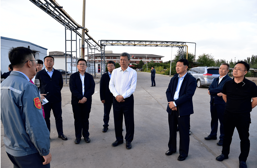 并与梅花生物集团董事长王爱军座谈交流